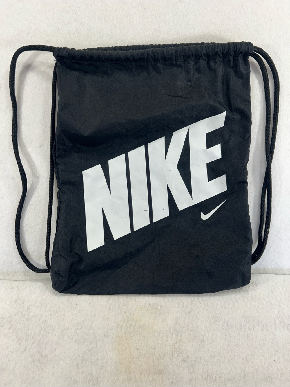 Nike Black Drawstring Backpack with White Logo